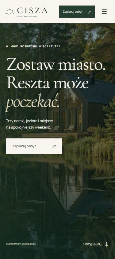 Mobilna strona CISZA z prezentacją domków nad jeziorem i zaproszeniem do zaplanowania pobytu