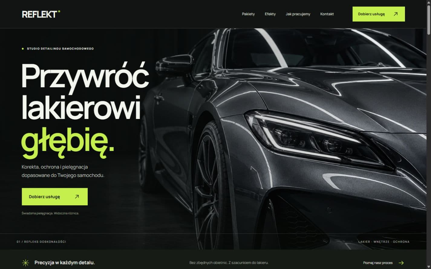 Koncepcyjna strona studia REFLEKT z ofertą detailingu i zdjęciem grafitowego samochodu